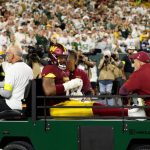 Commanders DE carted off, ruled out of TNF