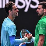 Djokovic reaches Aussie Open semis after injury to opponent